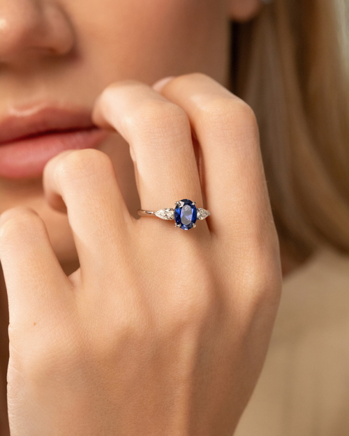 Blue Sapphire Oval Cut Three Stone Engagement Ring in Sterling Silver