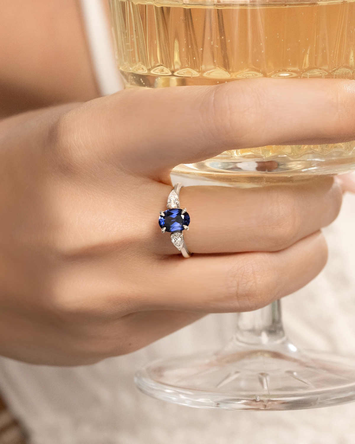 Blue Sapphire Oval Cut Three Stone Engagement Ring in Sterling Silver