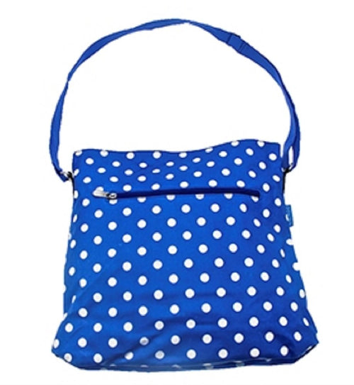 Dotty print long handled Extra Large Crossover Bag in a Matt Finish Oilcloth.