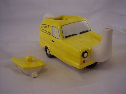 Three Wheeler Ornamental Tea Pot