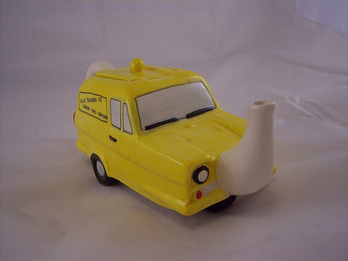 Three Wheeler Ornamental Tea Pot