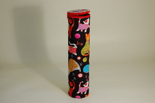 Knitting Pin holder - cylinder shape tube - fabric shows cartoon cats design on a dark background