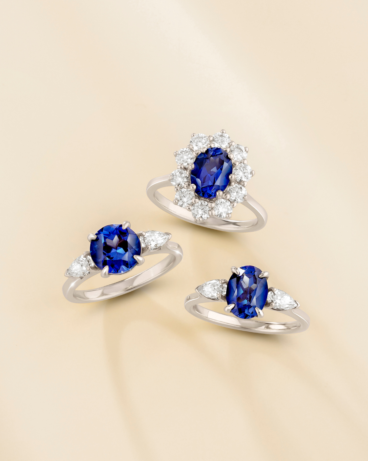 Blue Sapphire Oval Cut Three Stone Engagement Ring in Sterling Silver