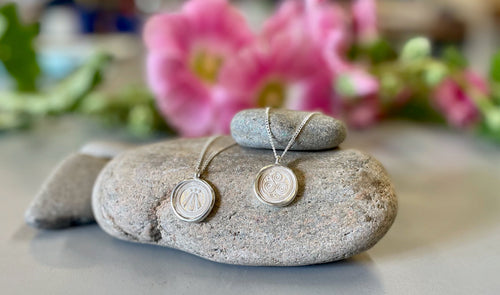 Symbolic Silver Pendants