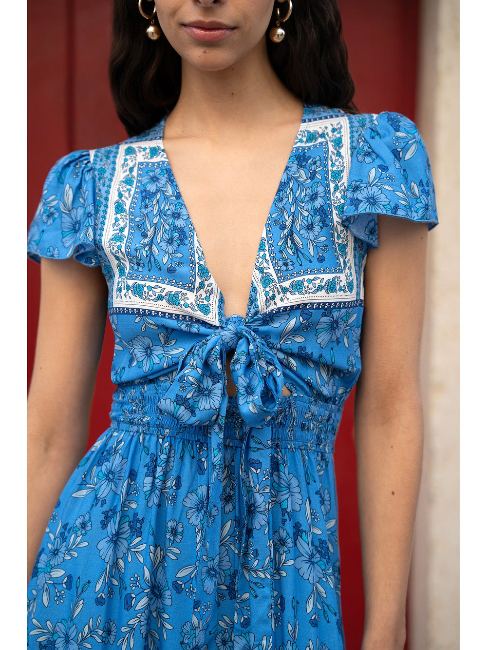 Mela Blue Ditsy Print Sun Dress With Cross Over Back Tie Front And Dip Hem