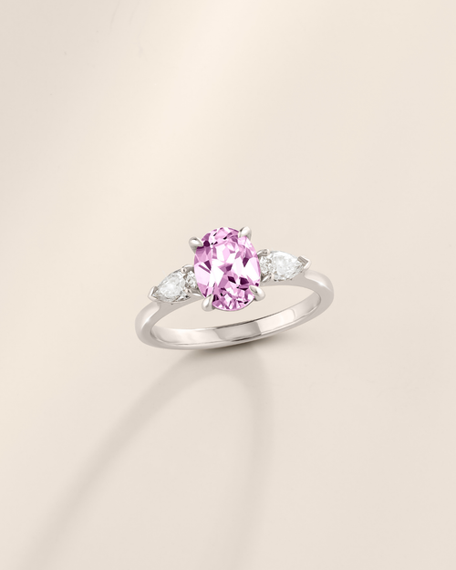 Pink Sapphire Oval Cut Three Stone Engagement Ring in Sterling Silver