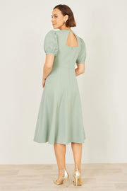Yumi Mint Skater Dress With Puff Sleeves And Buckle Detail
