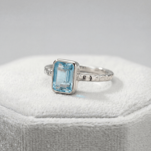 Tidewashed Sky Blue Topaz Ring – Octagonal Gemstone & Hammered Band