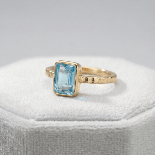 Tidewashed Sky Blue Topaz Ring – Octagonal Gemstone & Hammered Band